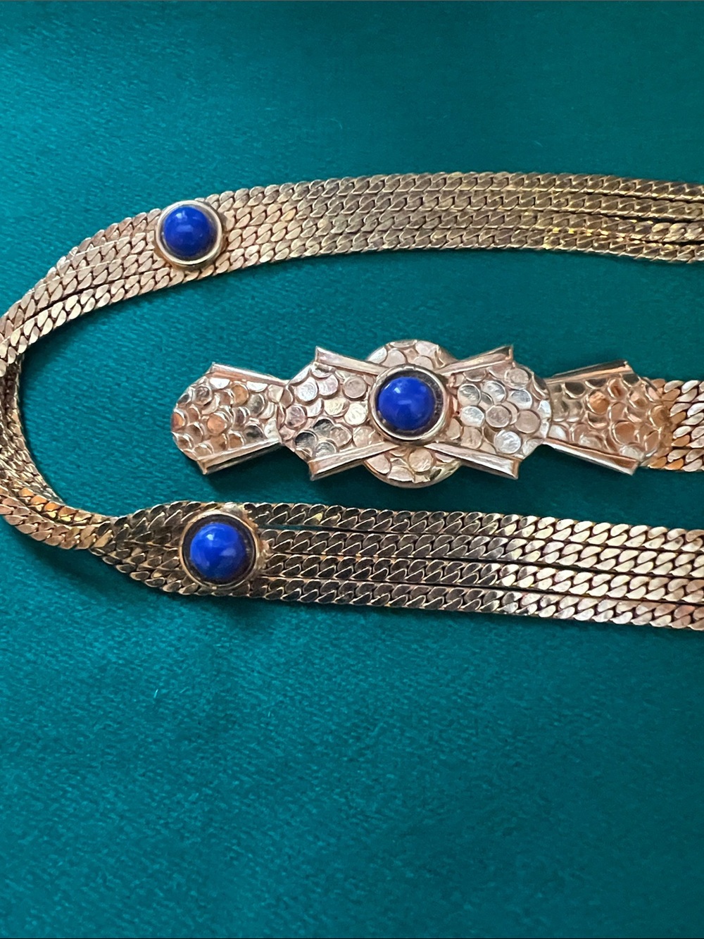 DIOOR gold tone herringbone chain belt.